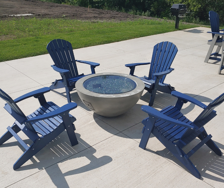 blue poly resin pre assembled adirondack chairs around fire pit