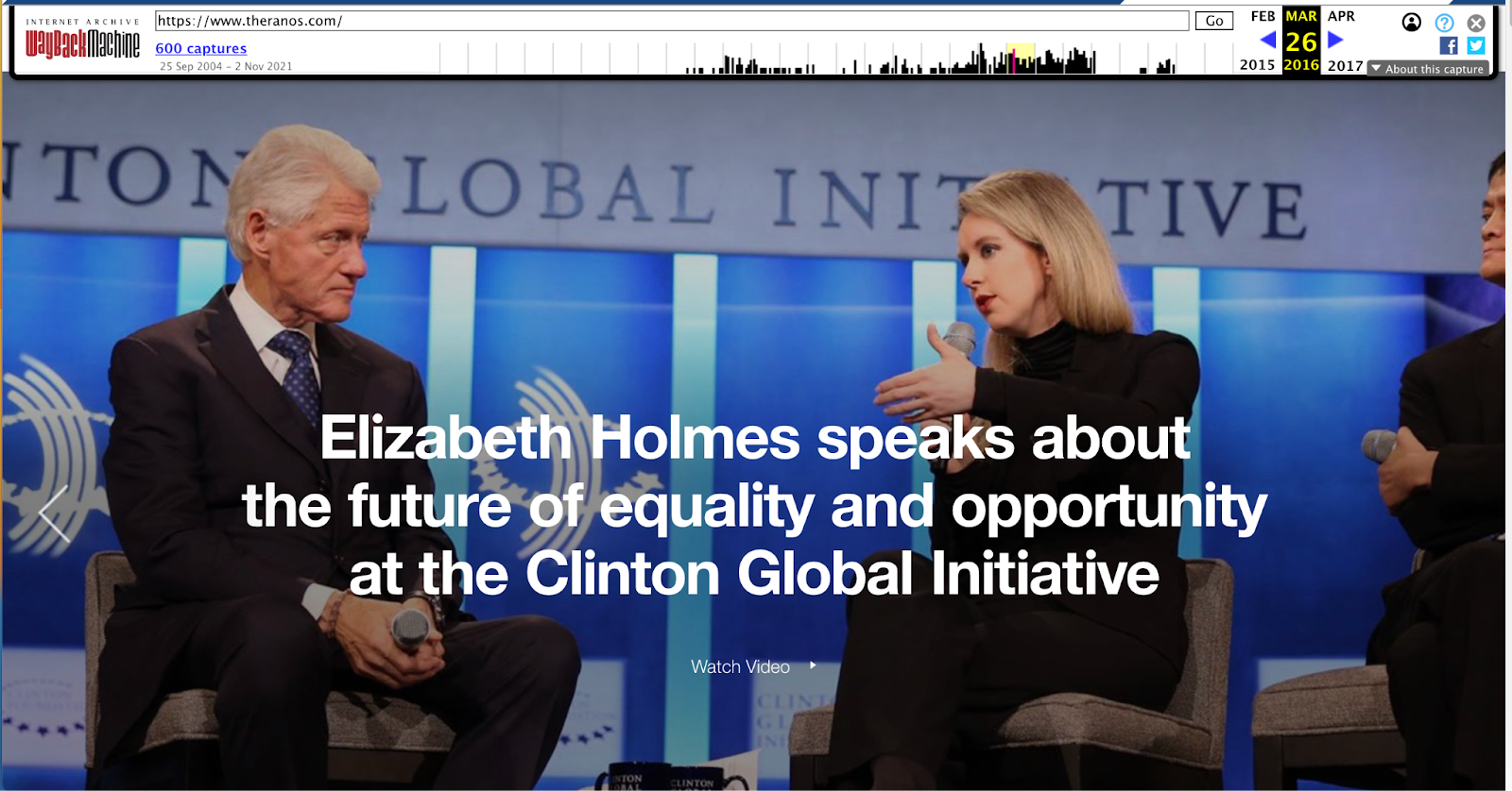 Screenshot of extinct Theranos homepage slider image featuring Bill Clinton speaking with Elizabeth Holmes