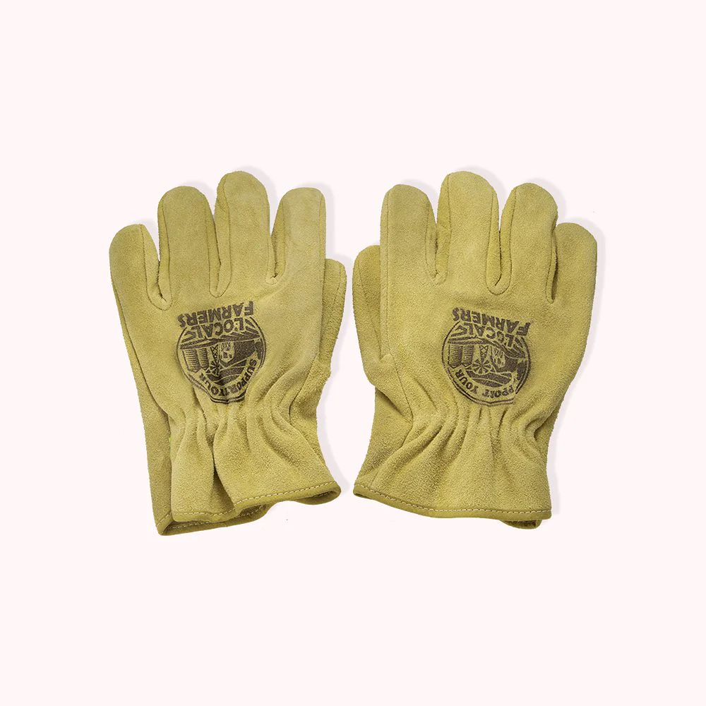 gants en cuir jaunes personnalisés sur la face supérieure. 