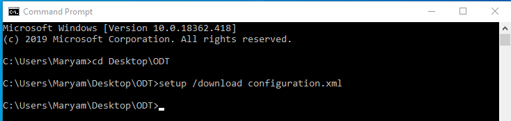 The Command Prompt window when the download is complete. There is a new line after "configure configuration.xml" showing the current directory where no command has been entered. The current directory is: C:\Users\Maryam\Desktop\ODT