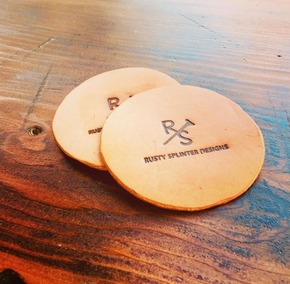 Rustic leather coaster with a branded design