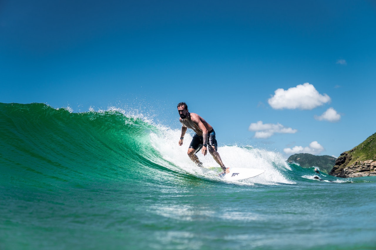 man surfing at chaweng beach