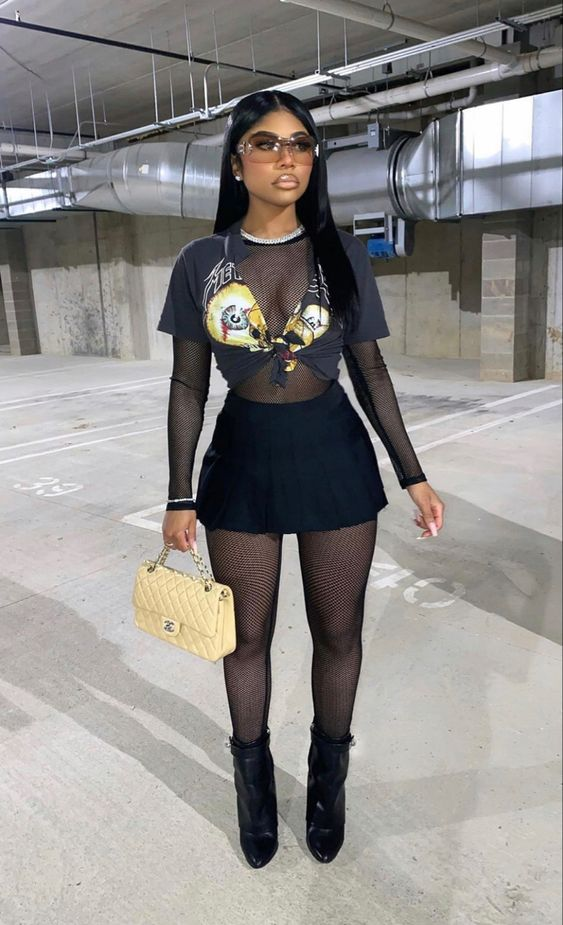 lady wearing crop top with micro mini skirt and leggings