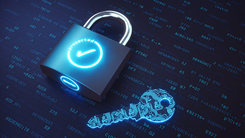 image of a lock and key over a background of code script.