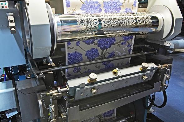 Gravure printing press in action and showcasing the technology behind the advantages of gravure printing for flexible packaging.