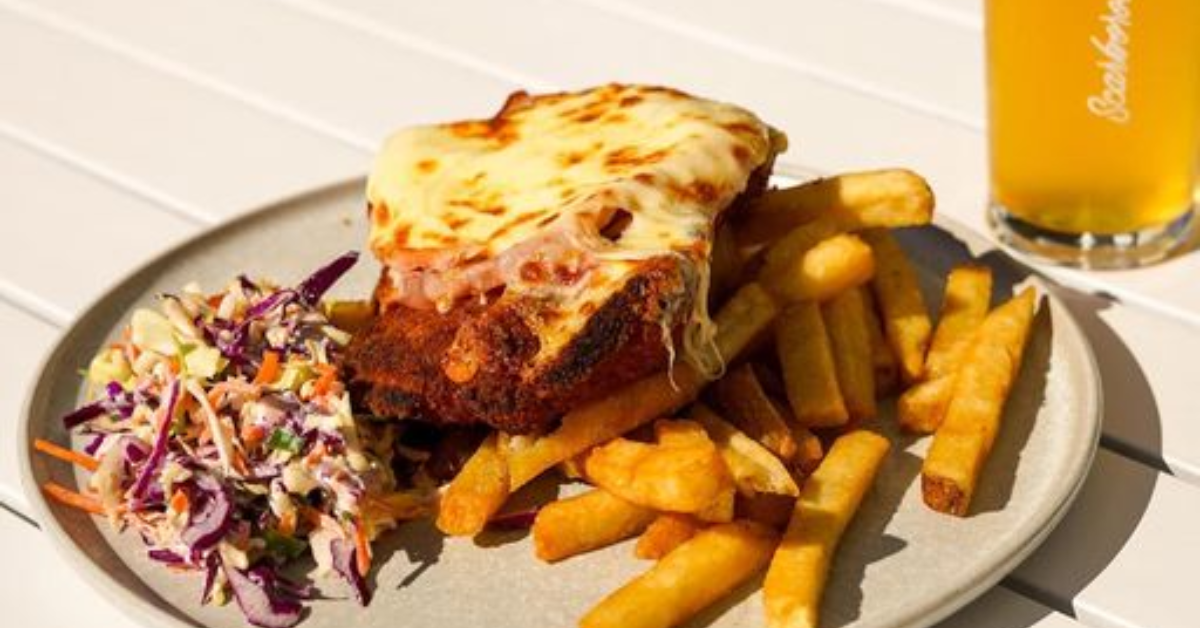 Giant chicken parmi with chips and slaw  
