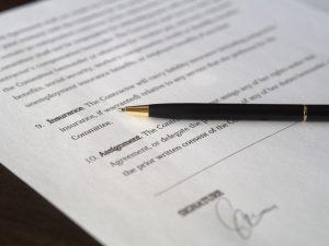A pencil placed on a contract.