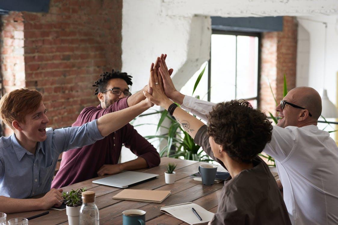 Free Photo Of People Holding Each Other's Hands Stock Photo