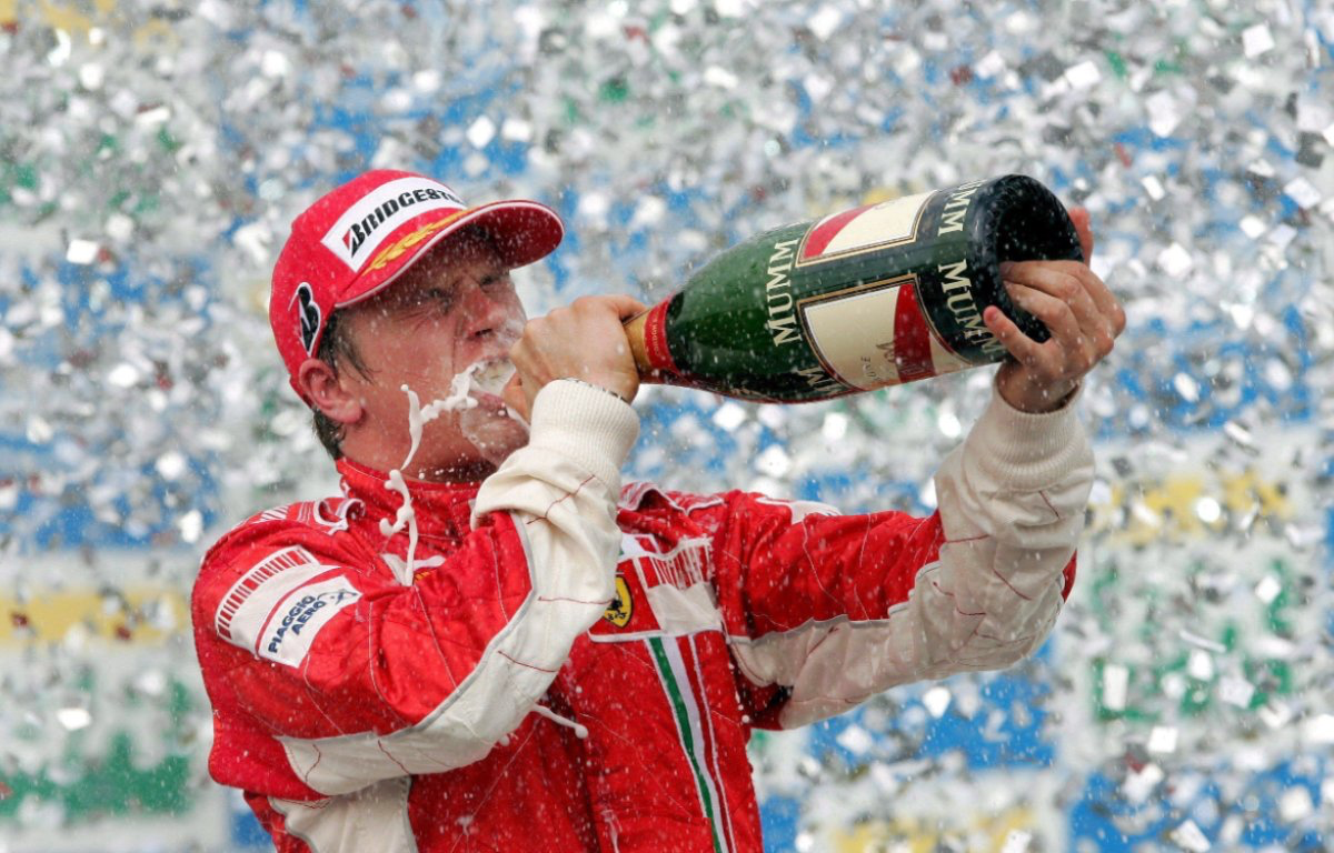 Kimi Räikkönen enjoying his victory drink in Brazil, 2007.