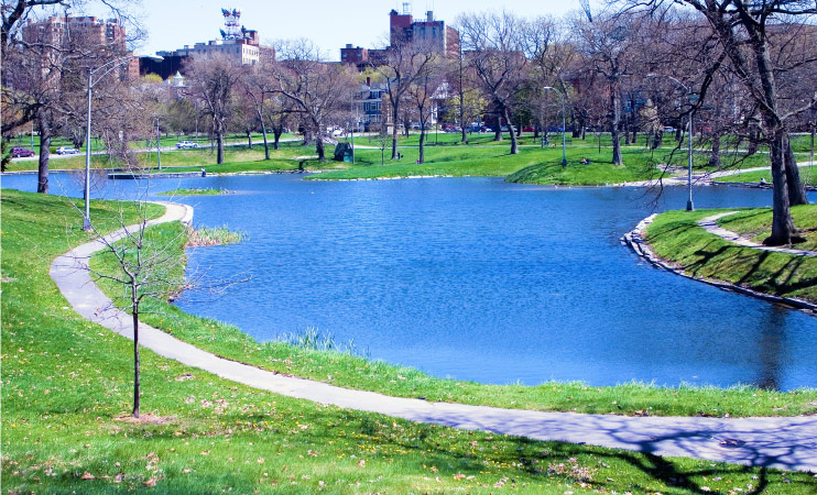 A pond and walking trail in Deering Oaks Park in the Parkside neighborhood of Portland, Maine