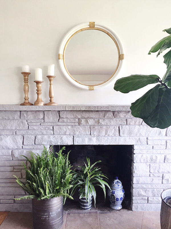 whitewashed stone fireplace