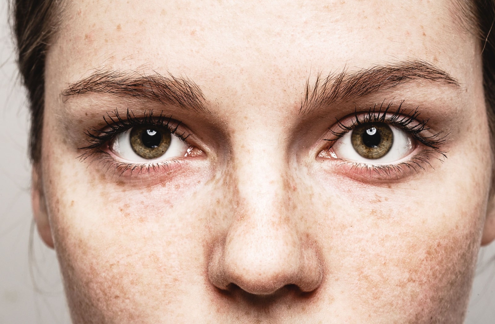 A close up shot of a woman's eyes