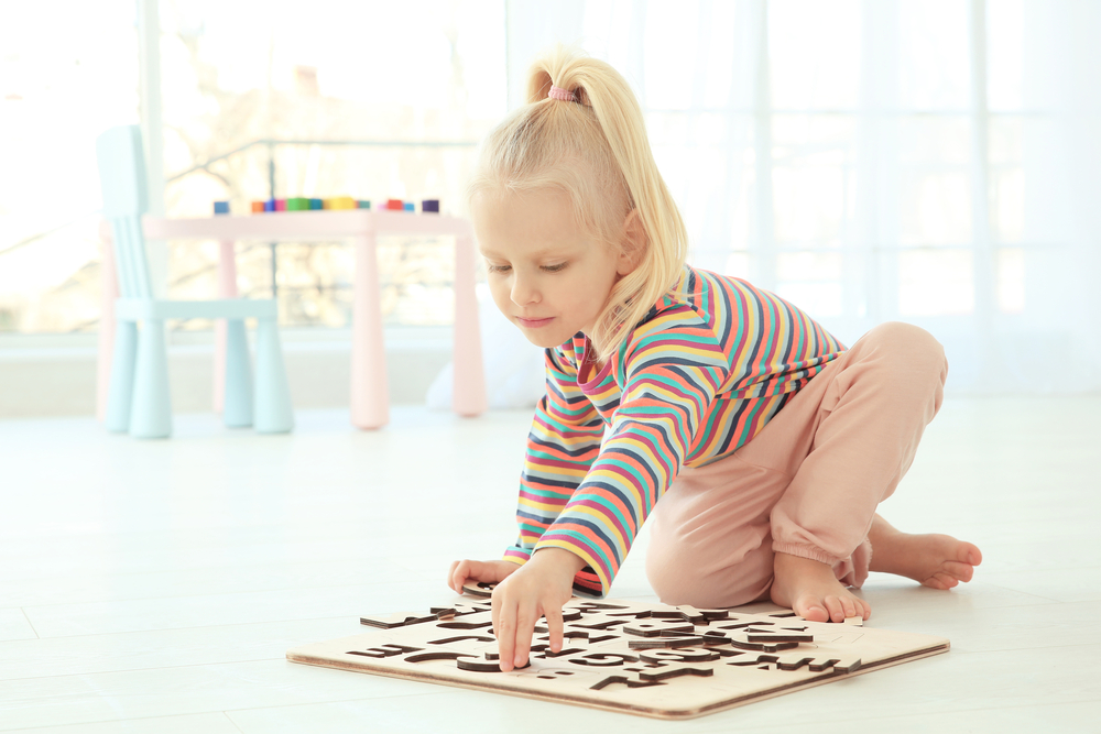 child learning letter recognition