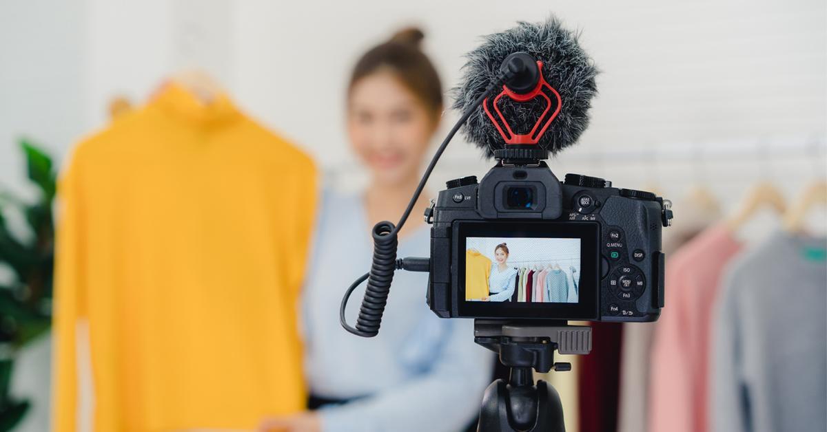 a woman having a commercial shoot for apparel