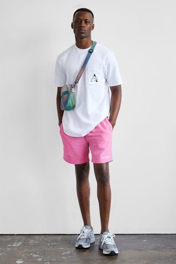 men posing in pink short and a white tshirt