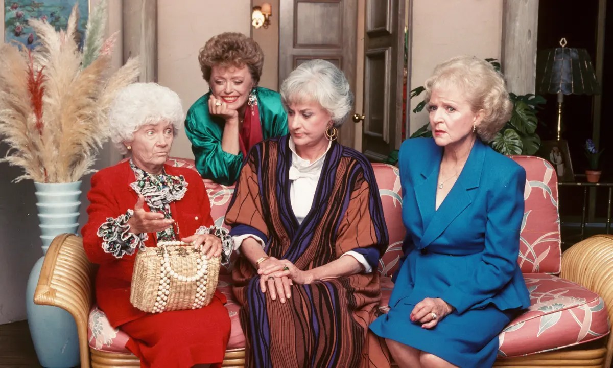 An episodic image of the four girls from The Golden Girls in a scene from the show.
