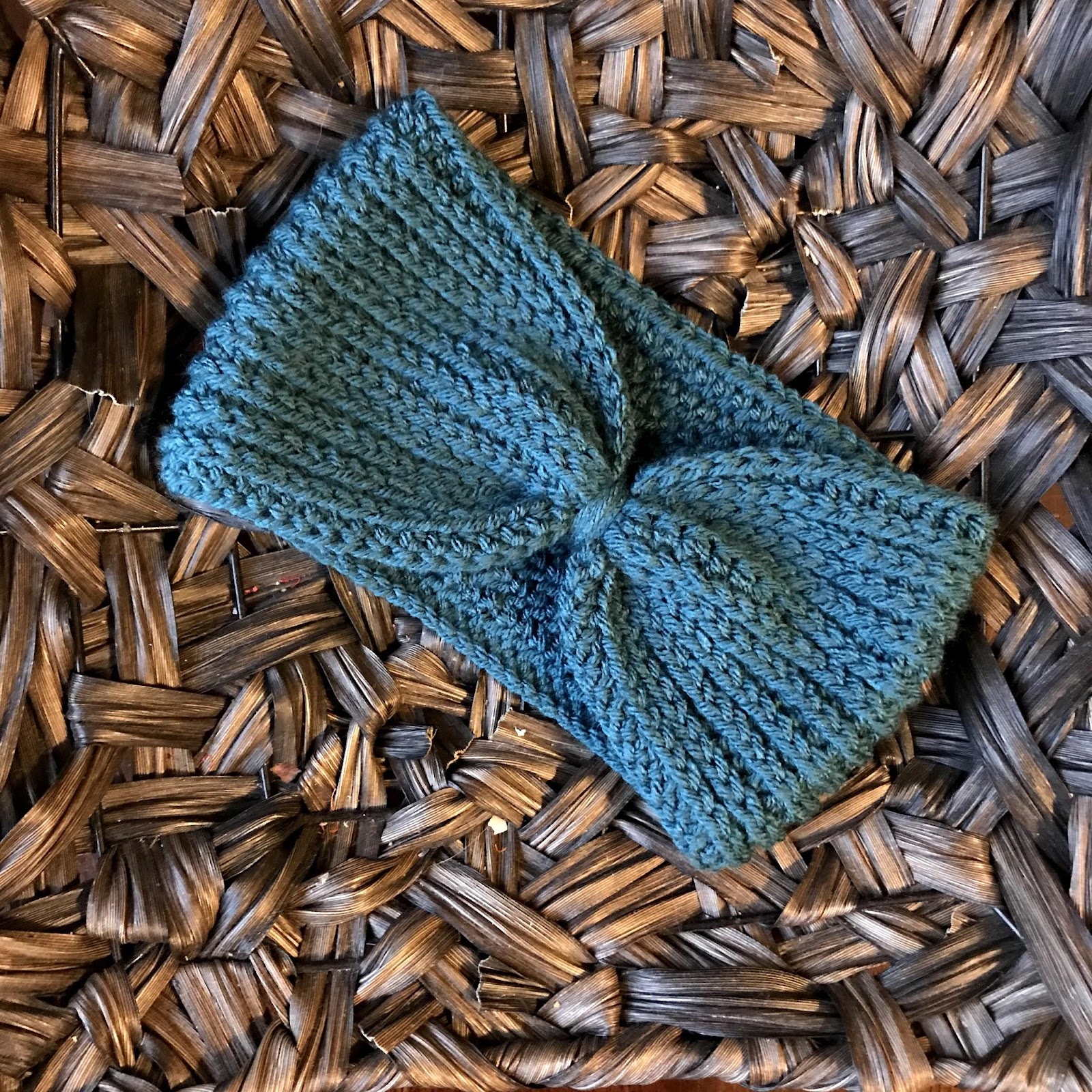 Camel Stitch Ear Warmer Crochet Pattern cinched together in the center