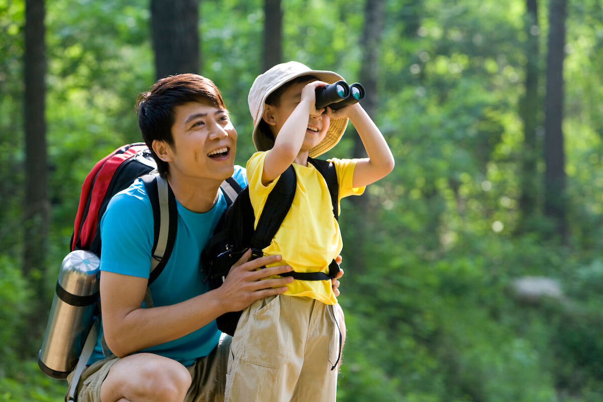 Father and son hiking together