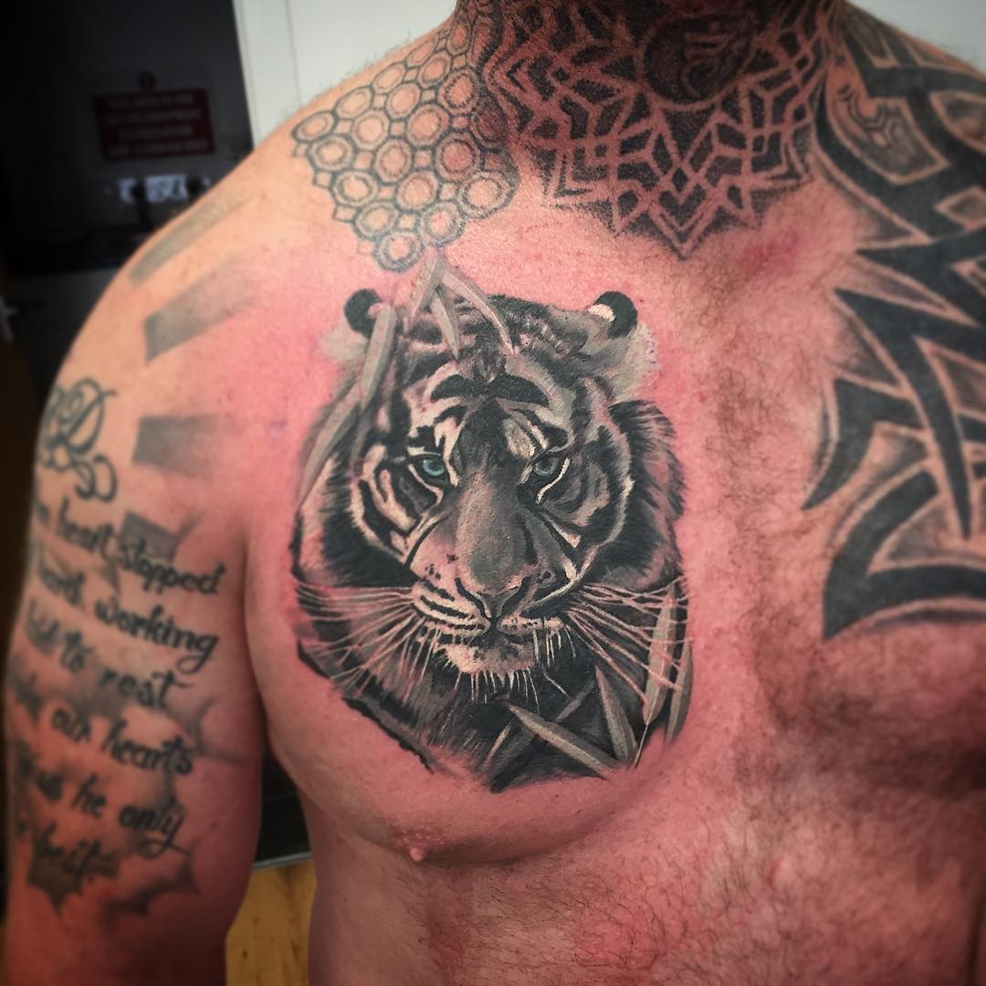 Realistic Black Ink Tiger Chest Tattoo