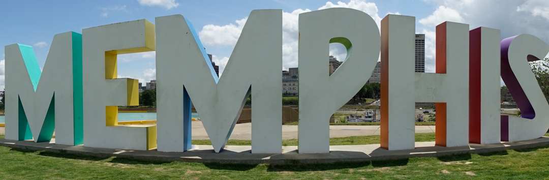 The Letters that spell MEMPHIS in all caps with the skyline of the city in background. 