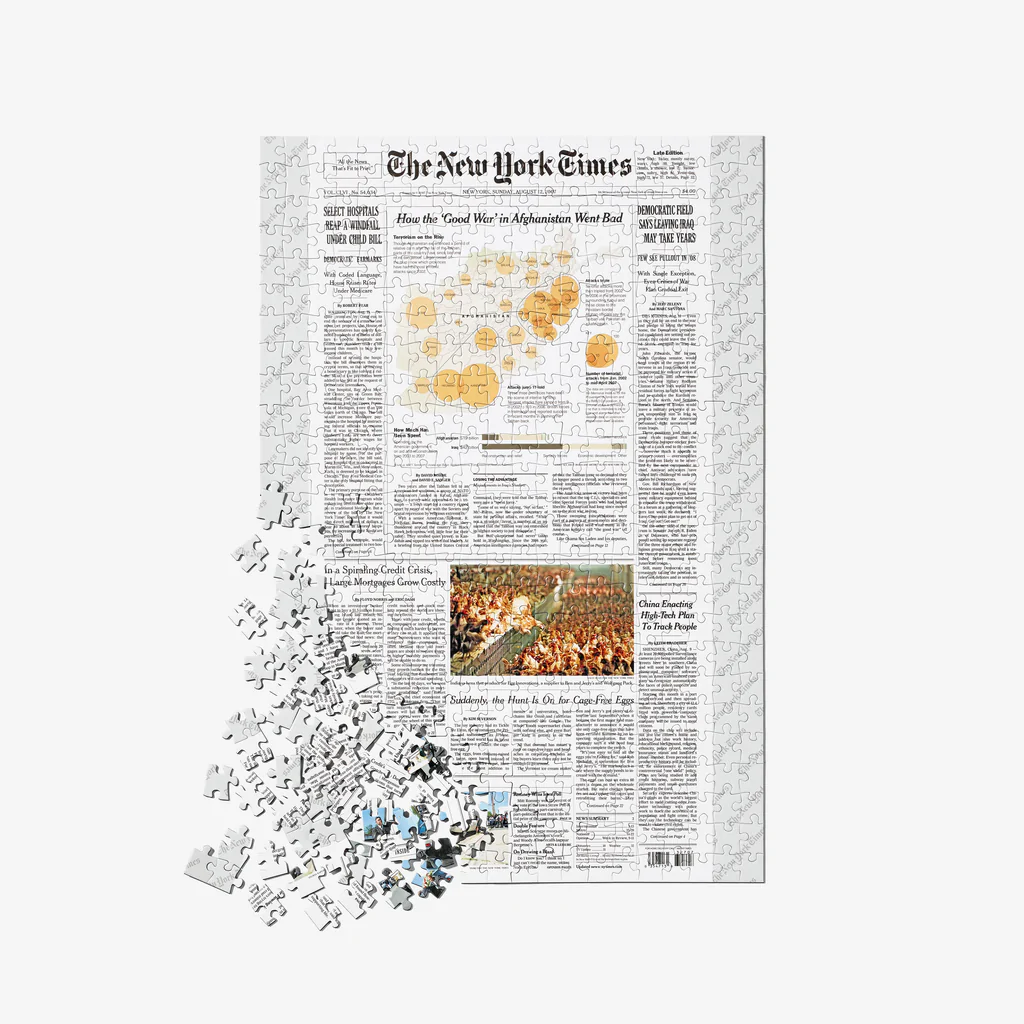 cadeau anniversaire, page principale du New-York Times, du jour de naissance, en puzzle.