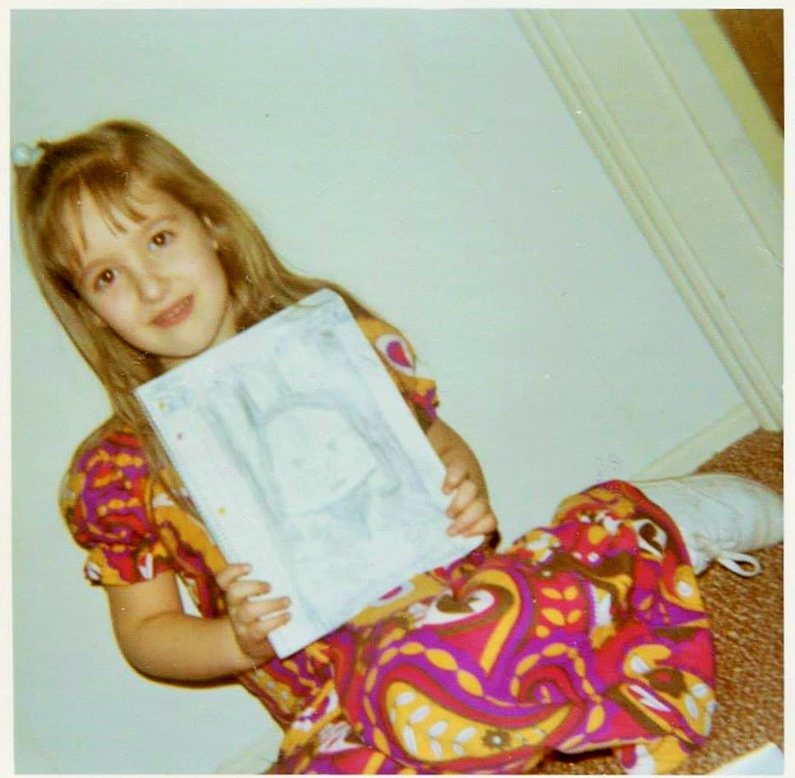 michele's 4 yr old pic with drawing (2).jpg