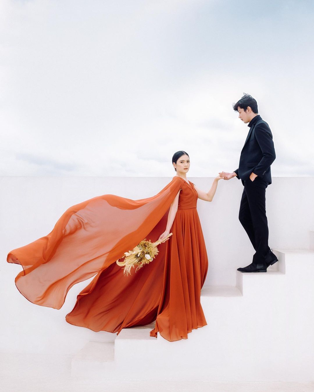 Red wedding dress on this beautiful bride.