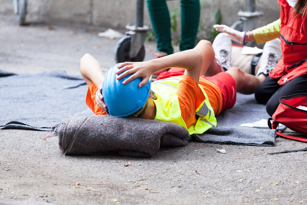 Worker lying on the floor