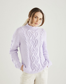 woman wearing a lavendar cable knit pullover