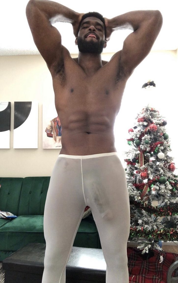 Marshall Price taking a selfie wearing seethrough white pajama bottoms where his fat cock shows through