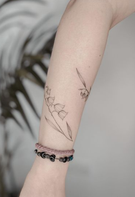 Arm Wrap Lily Of The Valley Tattoo