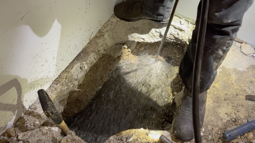 This is what hydro jetting a pipe looks like in action to fix a clogged up washer drain.