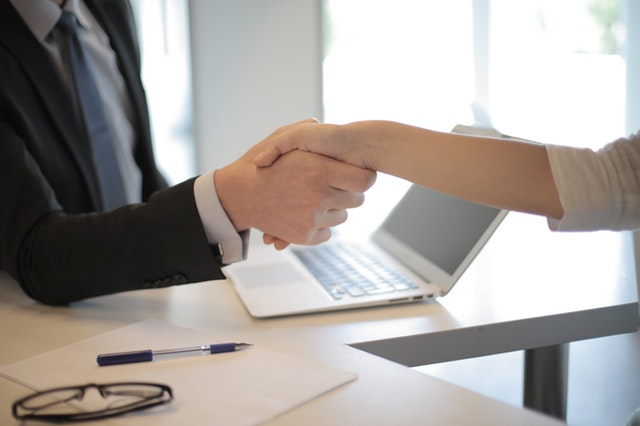 Two people shaking hands