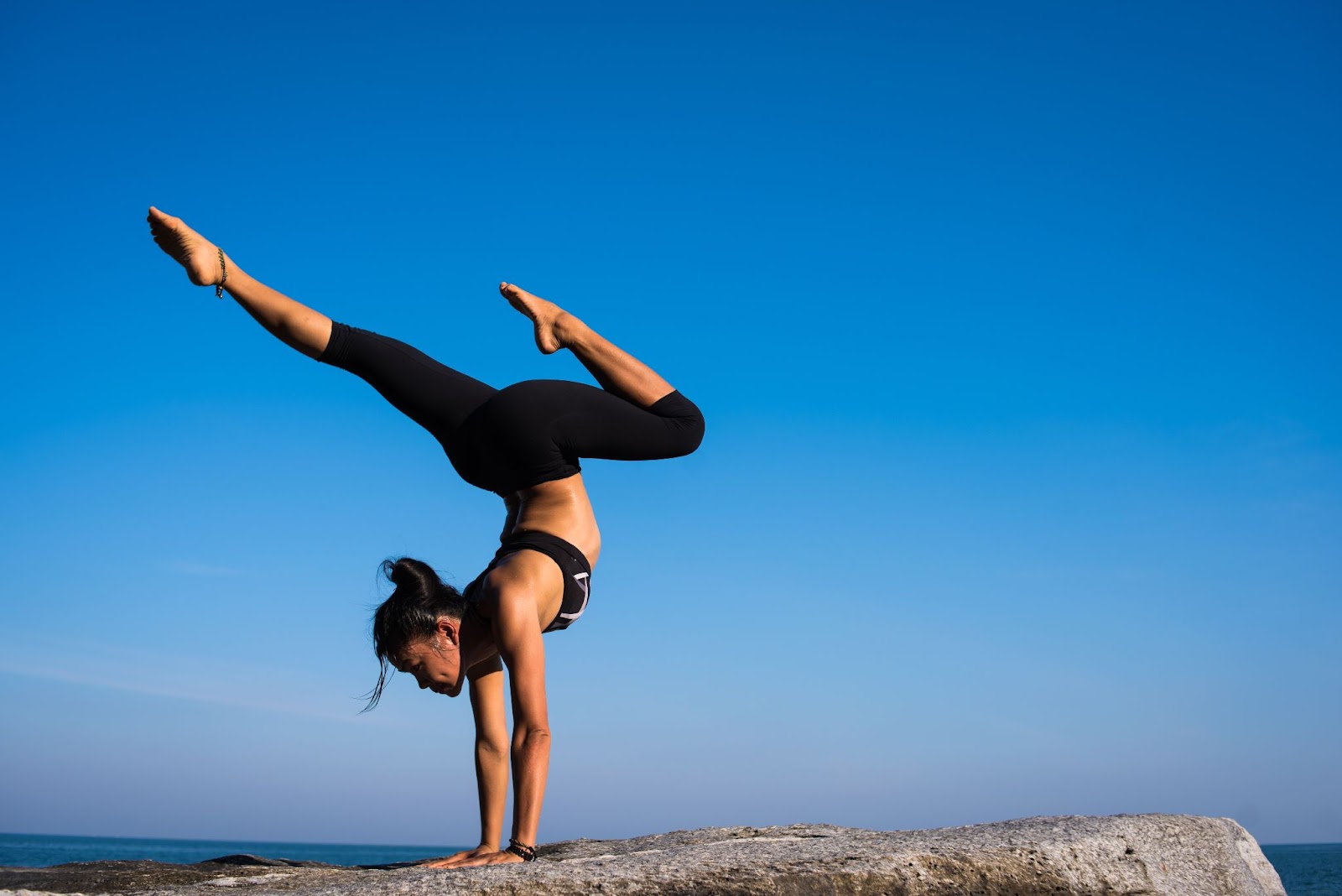Woman doing a handstand during yoga