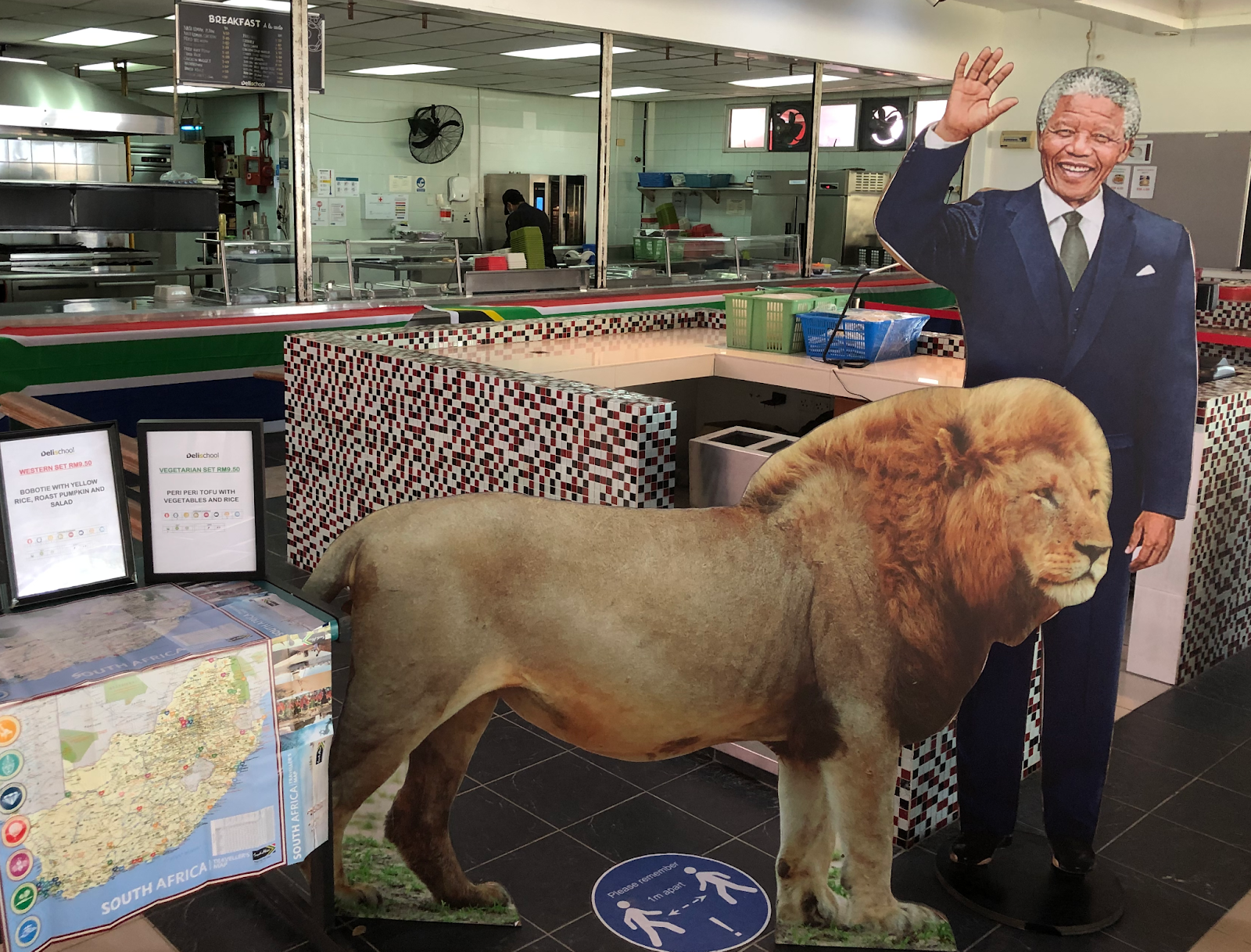 Card Lion and cut out of President Mandela