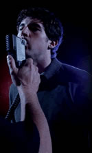 Young Man receiving a breathalyzer test for suspected drunk driving