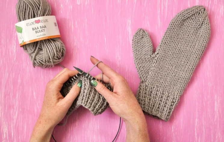 knitting gray mittens