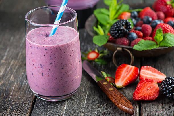 Homemade antioxidant summer fruits smoothie  protein shake and smoothies stock pictures, royalty-free photos & images