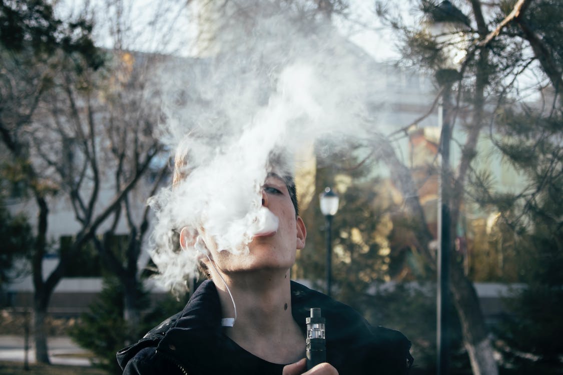 Free Photography of a Man Using Vape Stock Photo