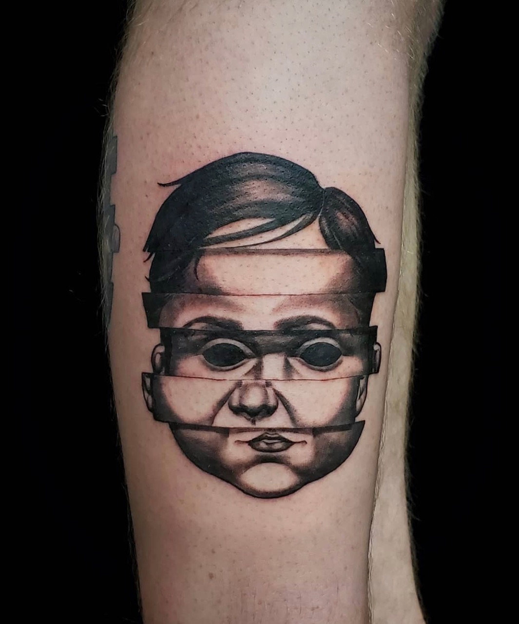 realistic child portrait tattoo