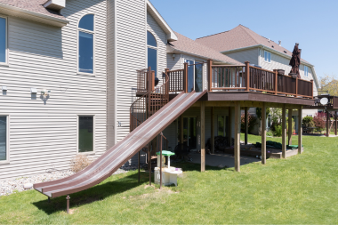 composite deck with raised structure and slide custom built michigan