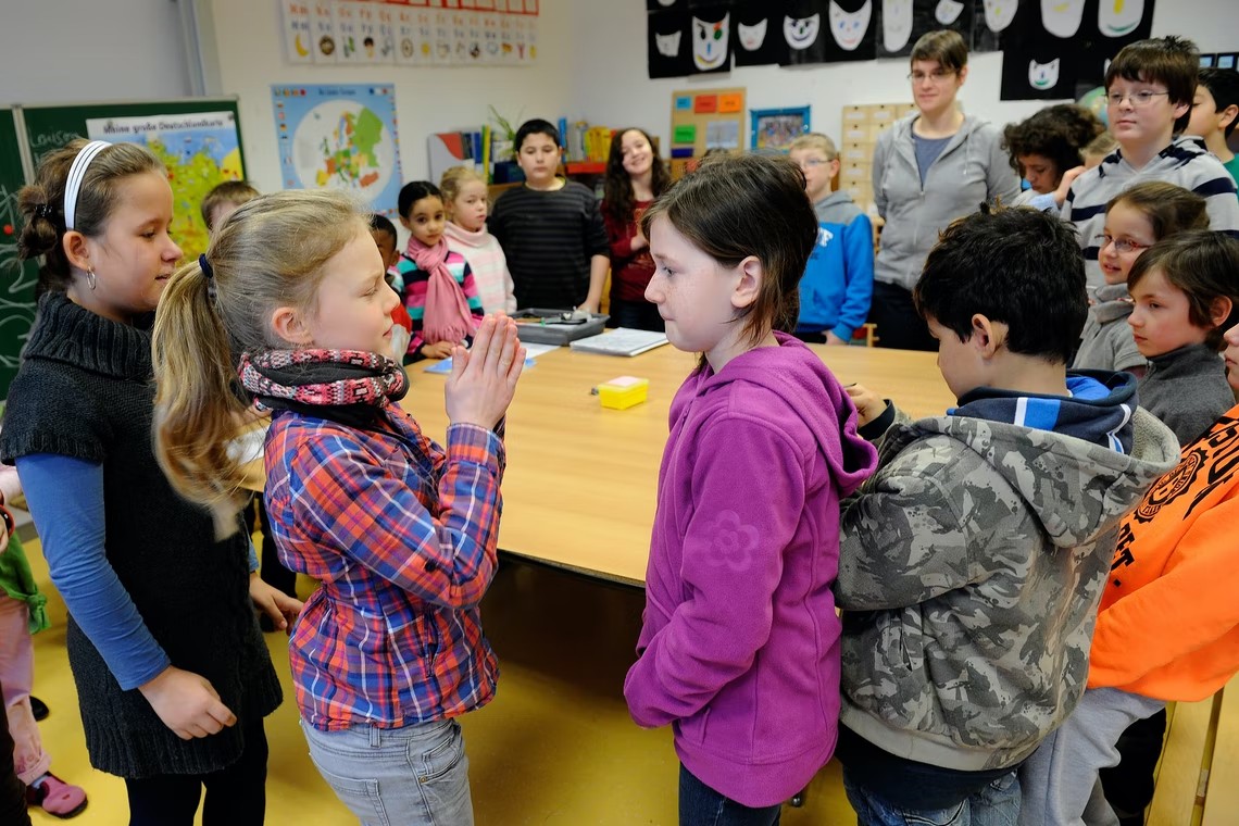 Students learn and play together in an inclusive classroom in Germany. | © Marius Becker/Corbis via Open Society Foundation