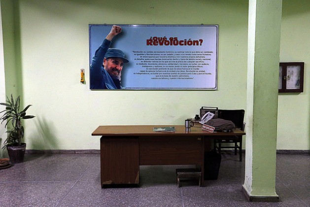 A picture of Fidel Castro behind an empty desk in a city government office in Havana on Saturday Nov. 26, a few hours after the death of the leader of Cuba’s revolution, at age 90. Credit: Jorge Luis Baños/IPS