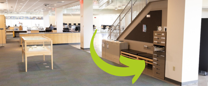 Photo of seed library in its new location directly across from the elevators in Rose library, against the stairs.