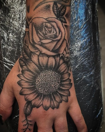 Dark Black Sunflower Tattoo On Hand