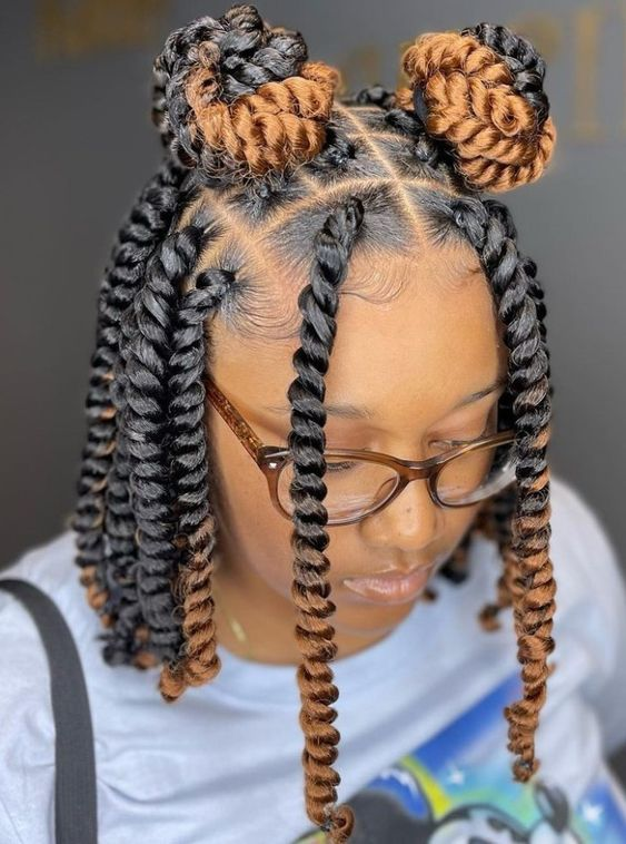 Frontal view of a lady rocking the chunky passion twists 