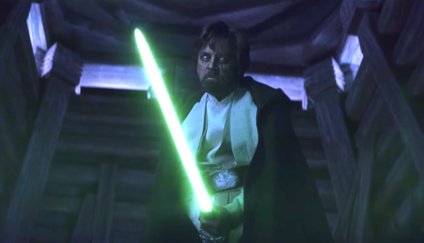 Luke holding his light saber