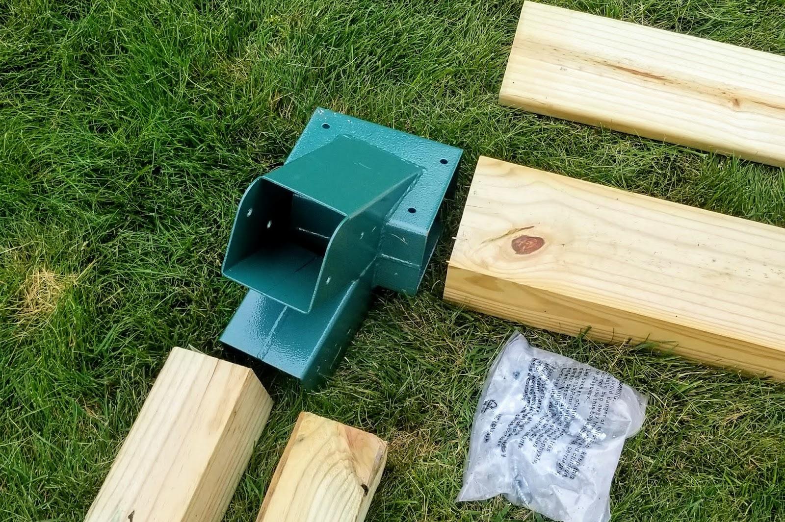 Avoid the high price tag of pre-assembled swing sets, and learn how to build a backyard swing set for cheap with this idea for kids!
