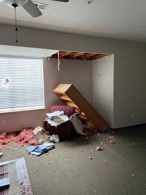 Photo: Burst pipes led to intense water damage in Genesis’s transitional housing units, covering recently-updated furniture with ceiling insulation