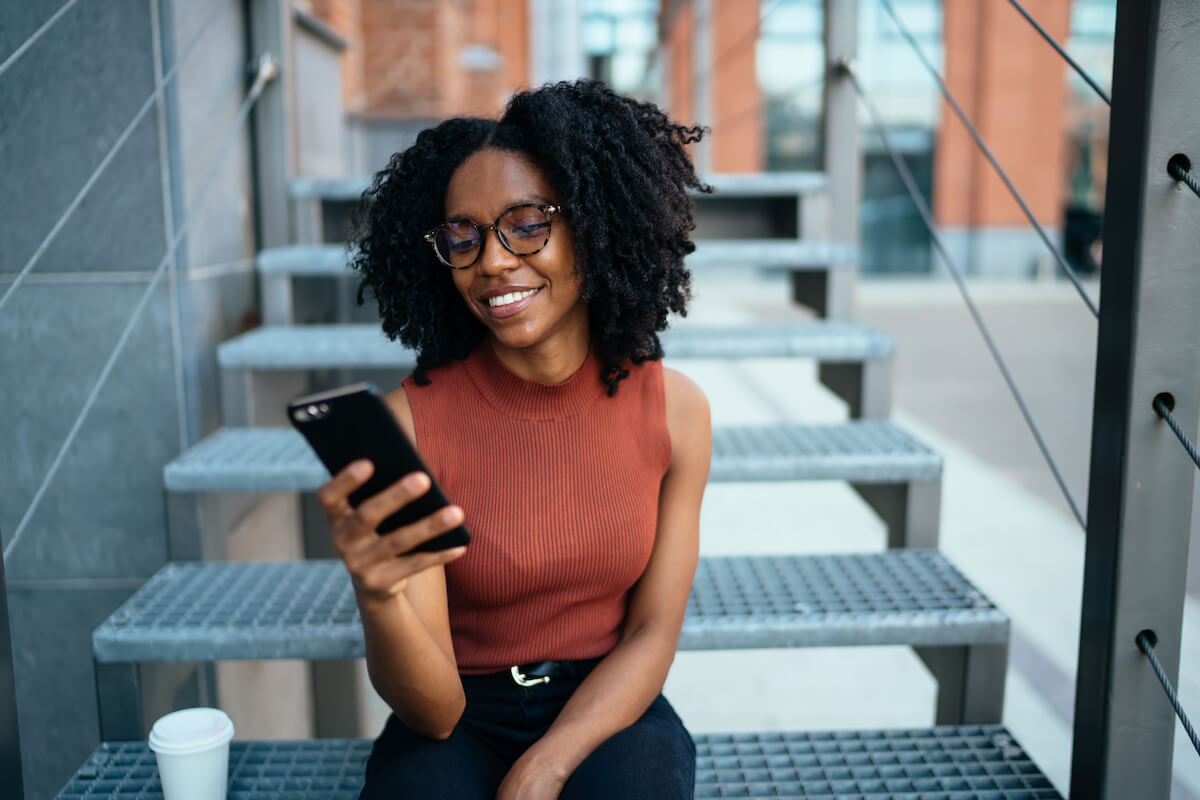 Patient support programs: woman using her phone